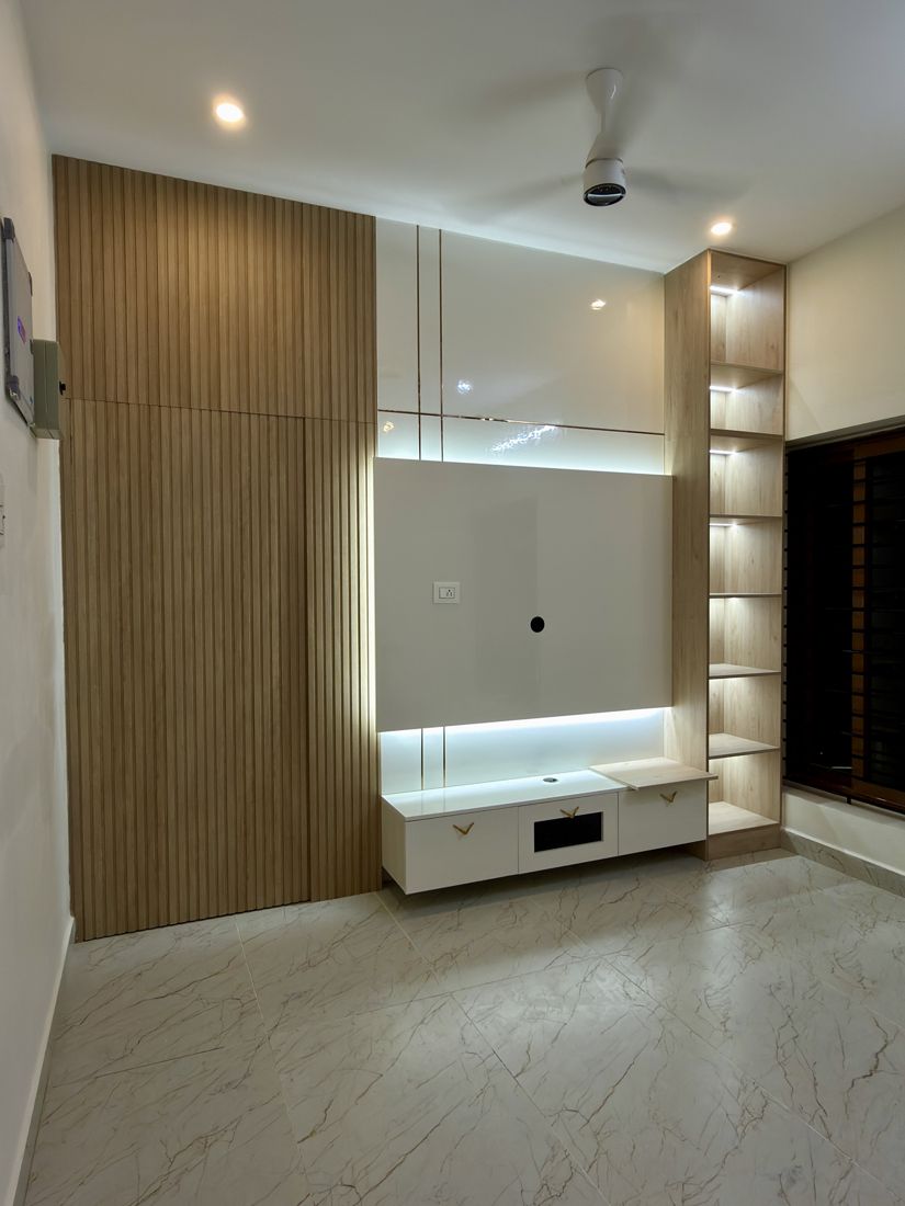 Backlit TV unit with wood panelling in a family home, Chennai