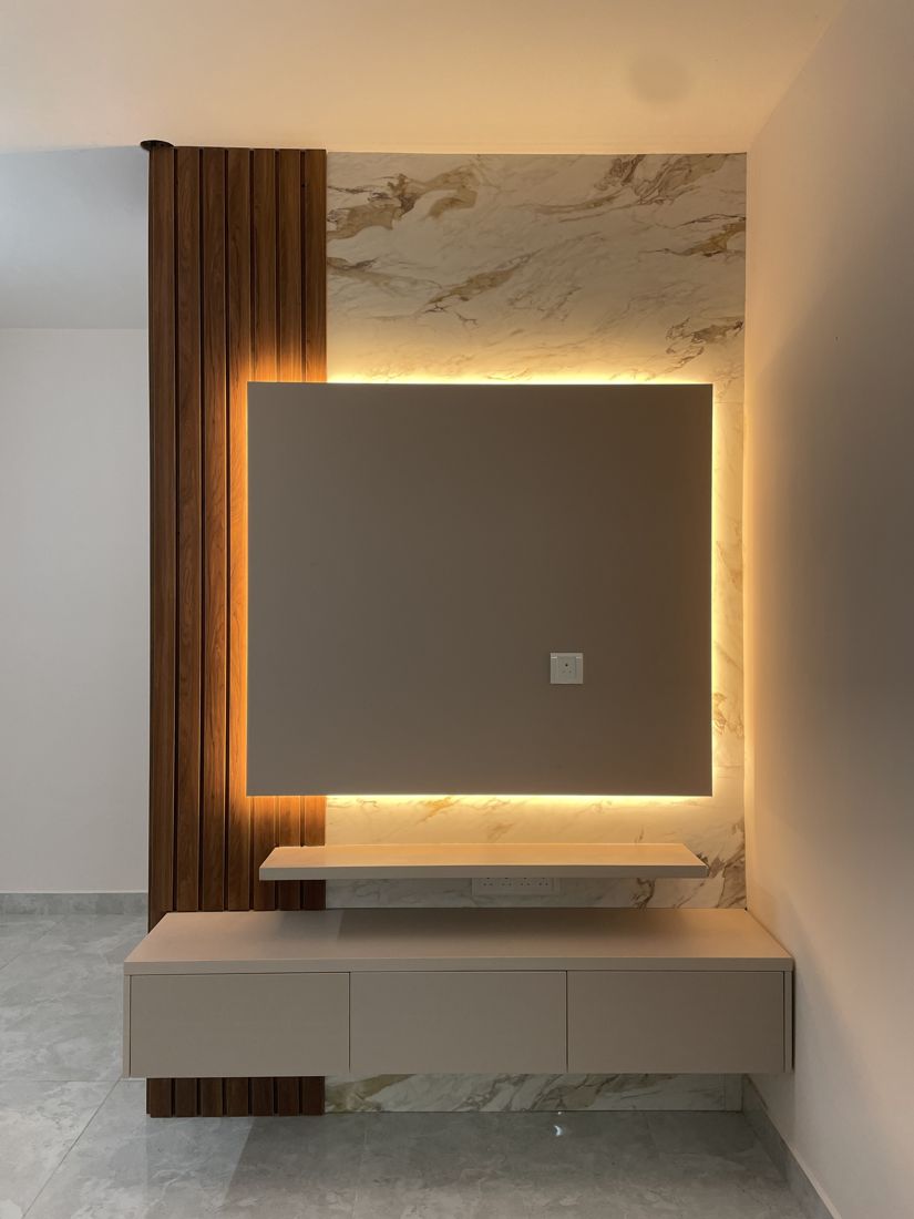 Backlit marble feature TV wall in a premium Chennai residence